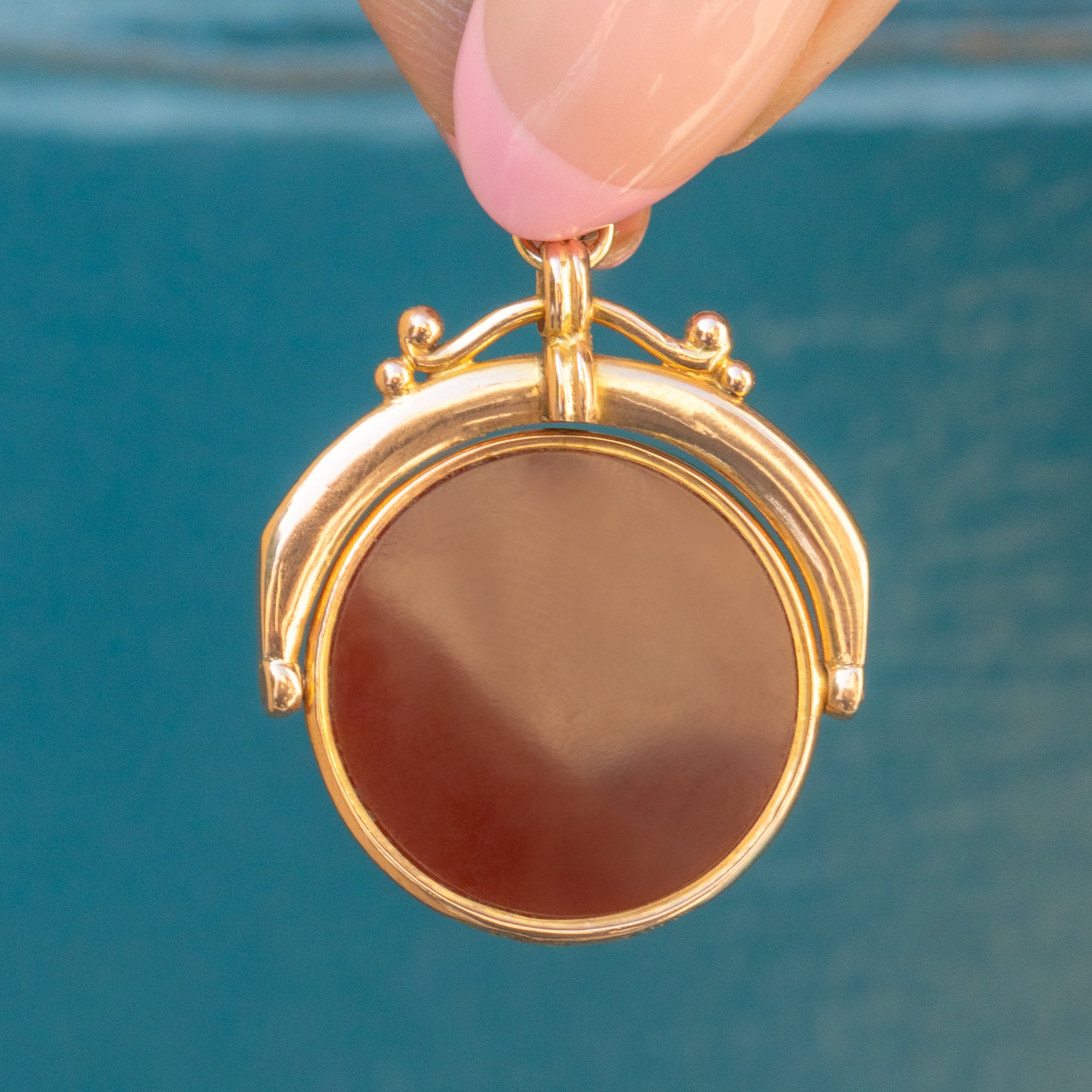 Edwardian 9ct Gold Carnelian Spinner Fob Pendant - Main Image