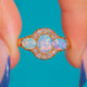 18ct Gold Opal and Diamond ring, front view of the three cabochons