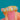 Opal and Diamond ring, angled view of the colourful cabochons