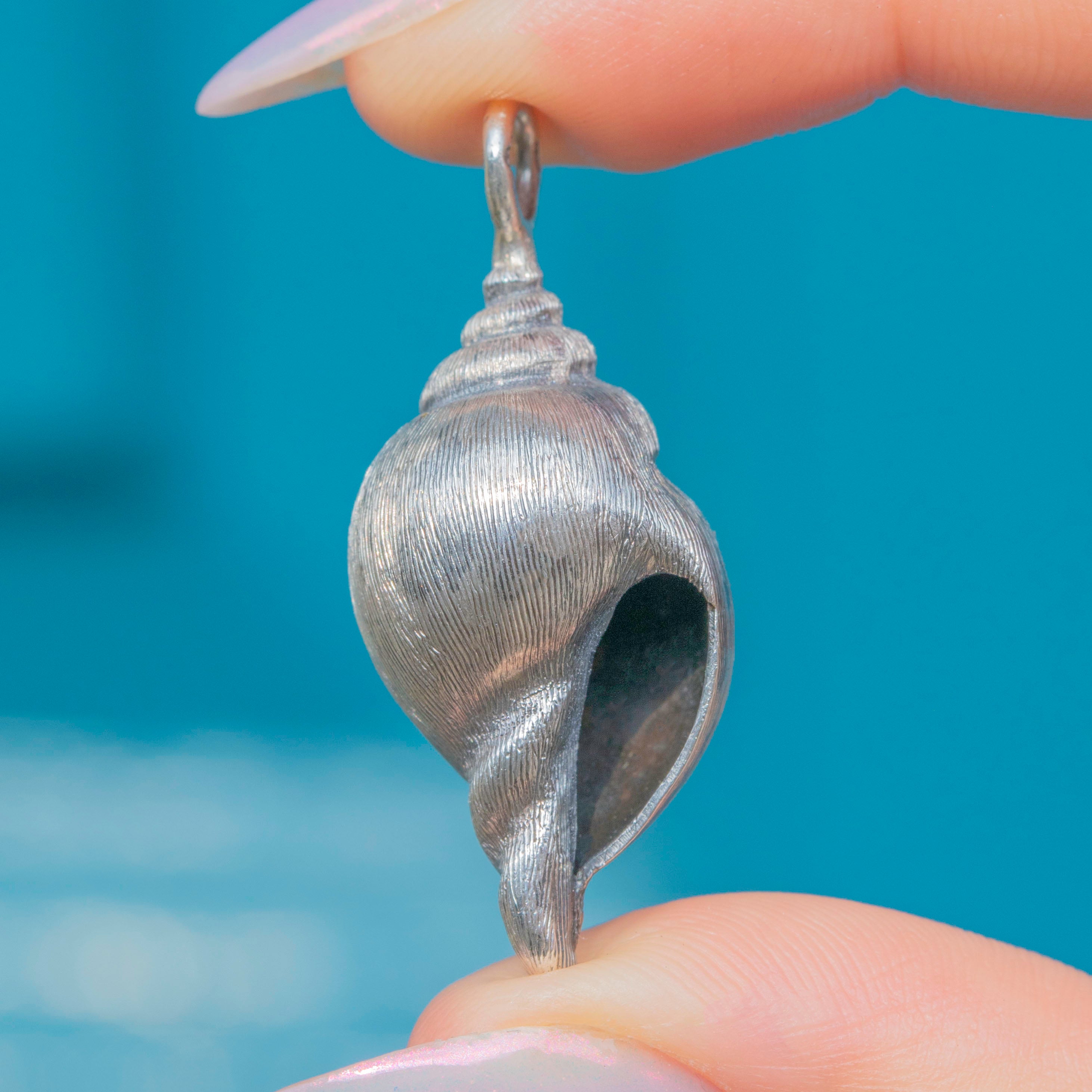Silver Conch Shell Pendant