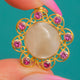Arts and Crafts 18ct Gold Mother of Pearl Ruby Openwork Flower Pendant