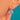 Opaline earring worn at an angle