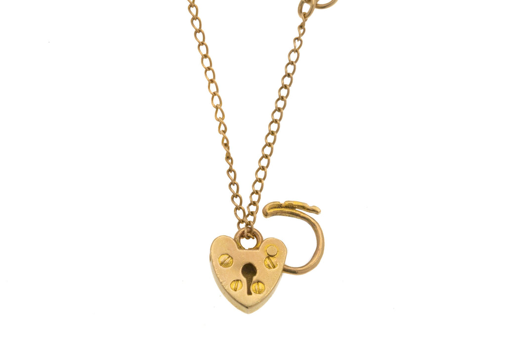 6" 9ct Gold Curb Bracelet with Heart Padlock, 4.3g